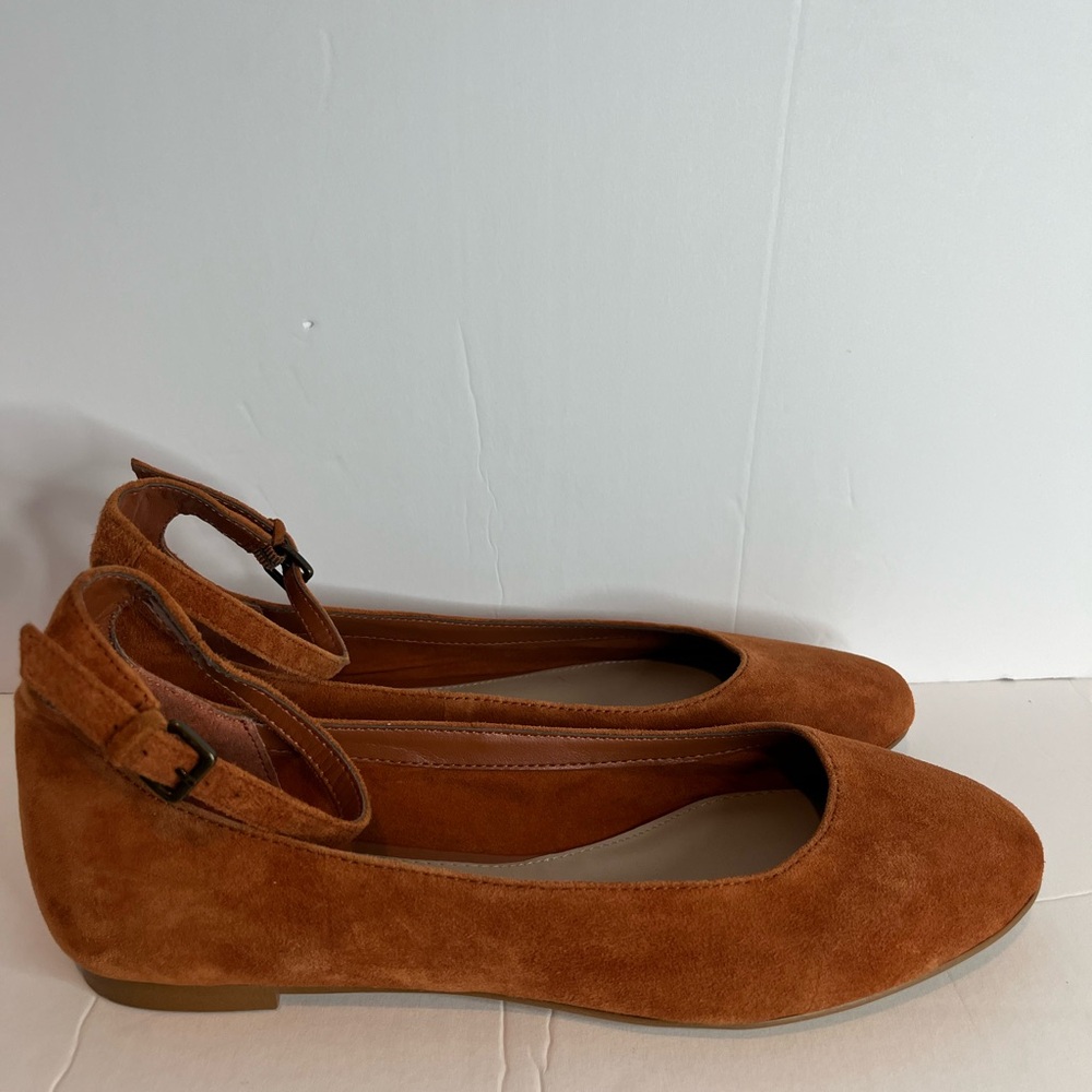 Women's orange suede ballet flats with ankle straps